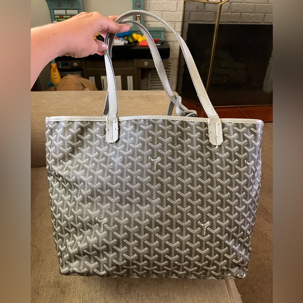 Designer bag with pouch